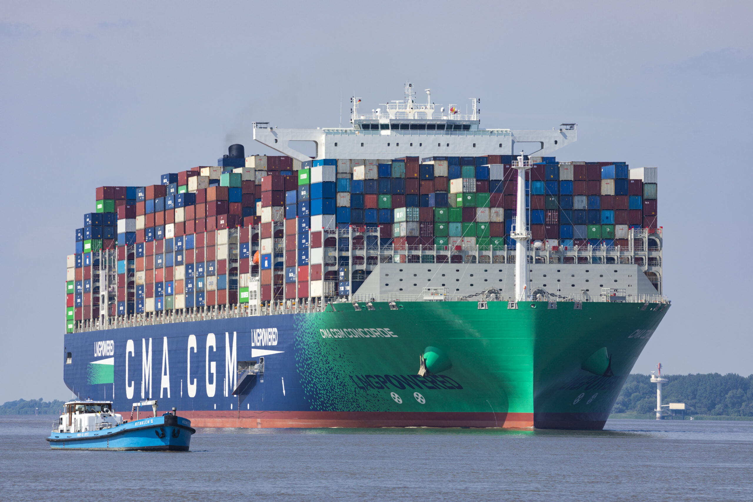 Container vessel CMA CGM CONCORDE on Elbe river heading to Hamburg.